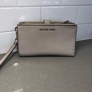 Gray authentic Michael Kors wristlet & cell phone